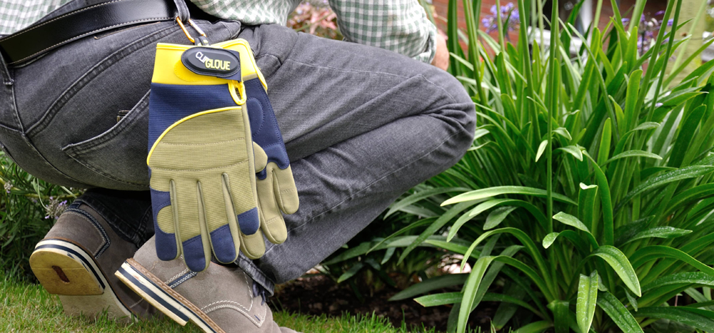 Clip Glove gardening gloves clipped to a belt loop